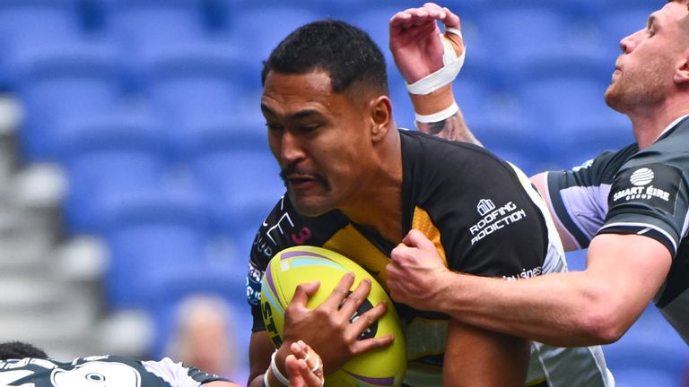 York's Toa Mata'afa crashes through the Huddersfield defence 