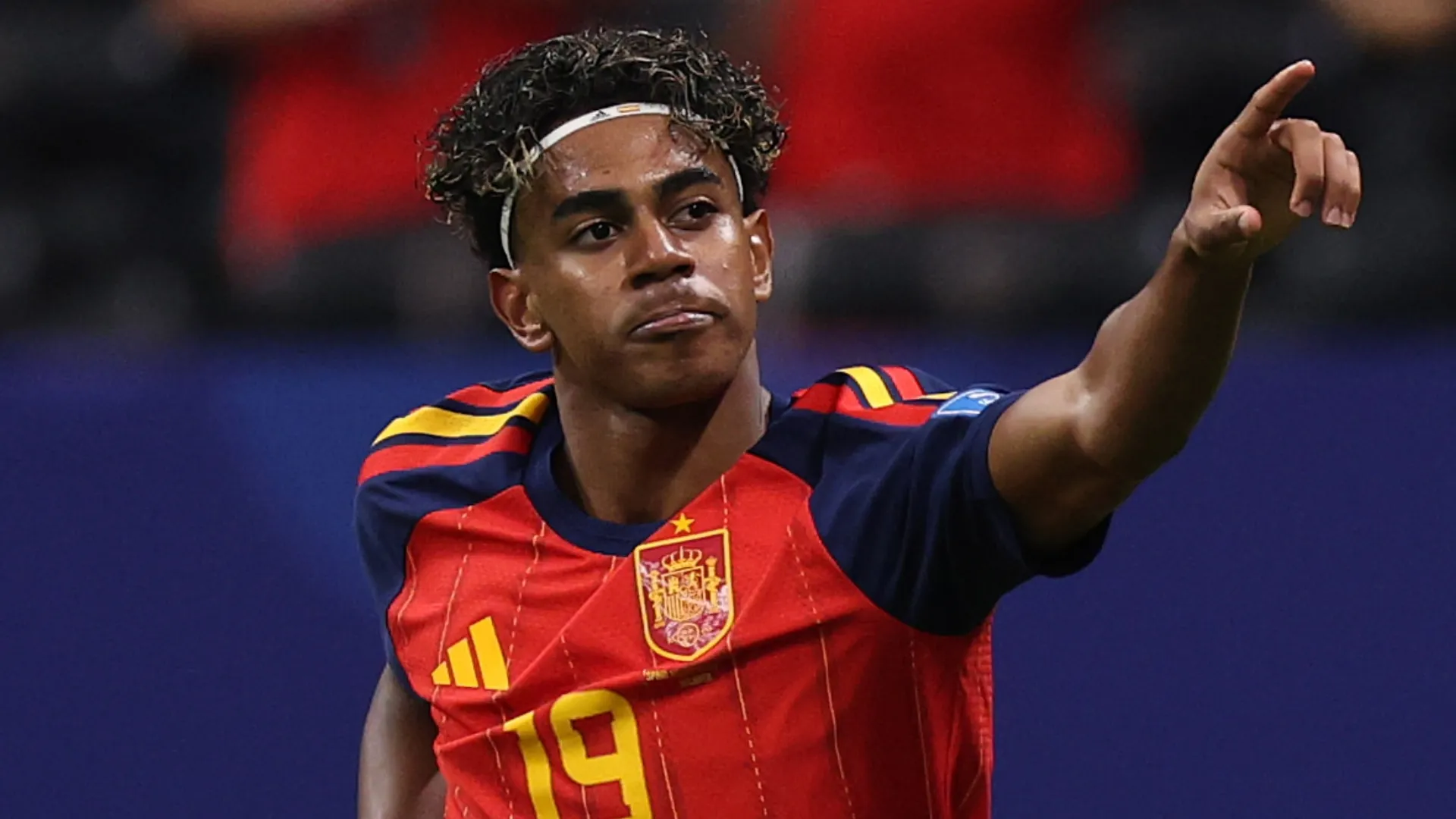 Lamine Yamal #19 of Spain celebrates scoring a goal.