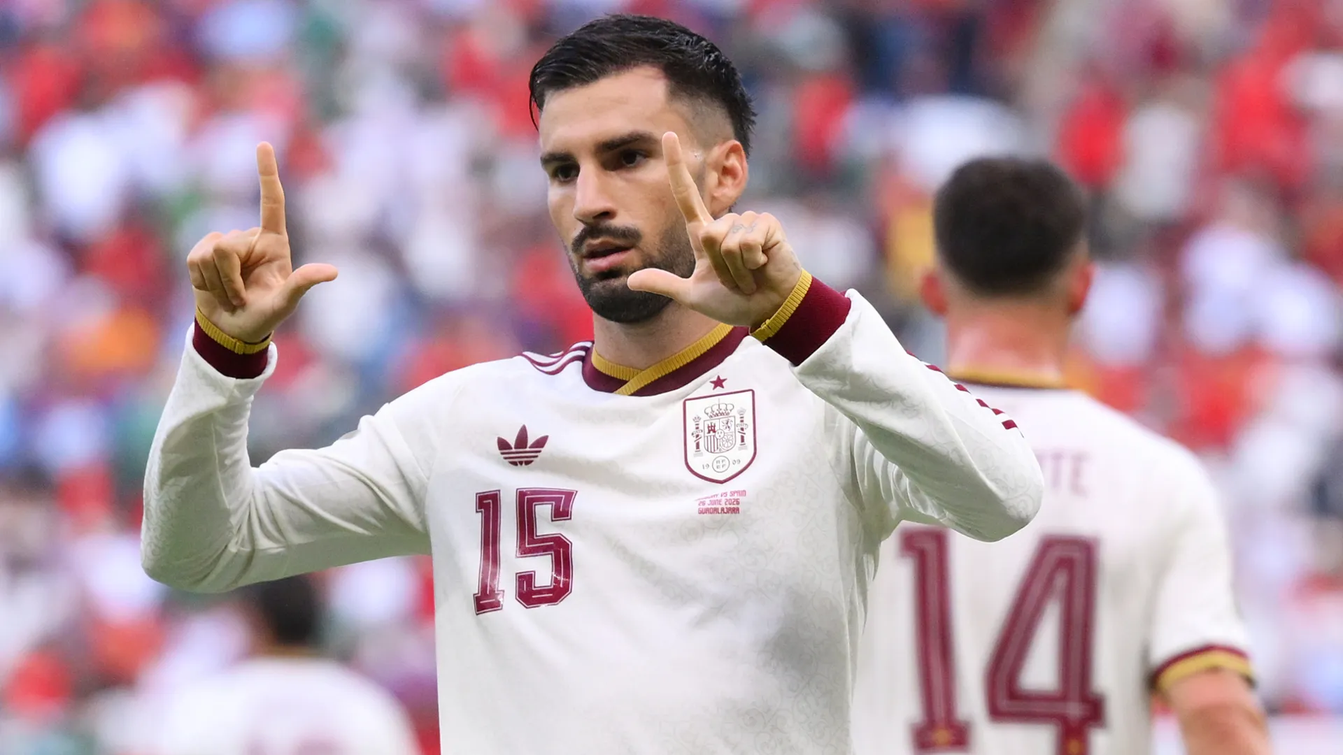 Alex Baena celebrates a goal for Spain.