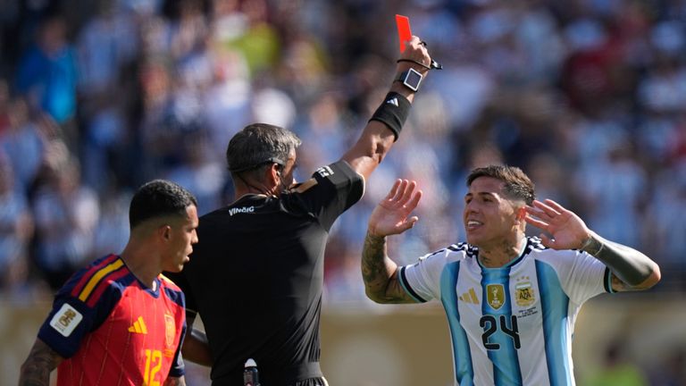 Referee Slavko Vincic shows a red card to Argentina's Enzo Fernandez (AP Photo/Frank Franklin II)